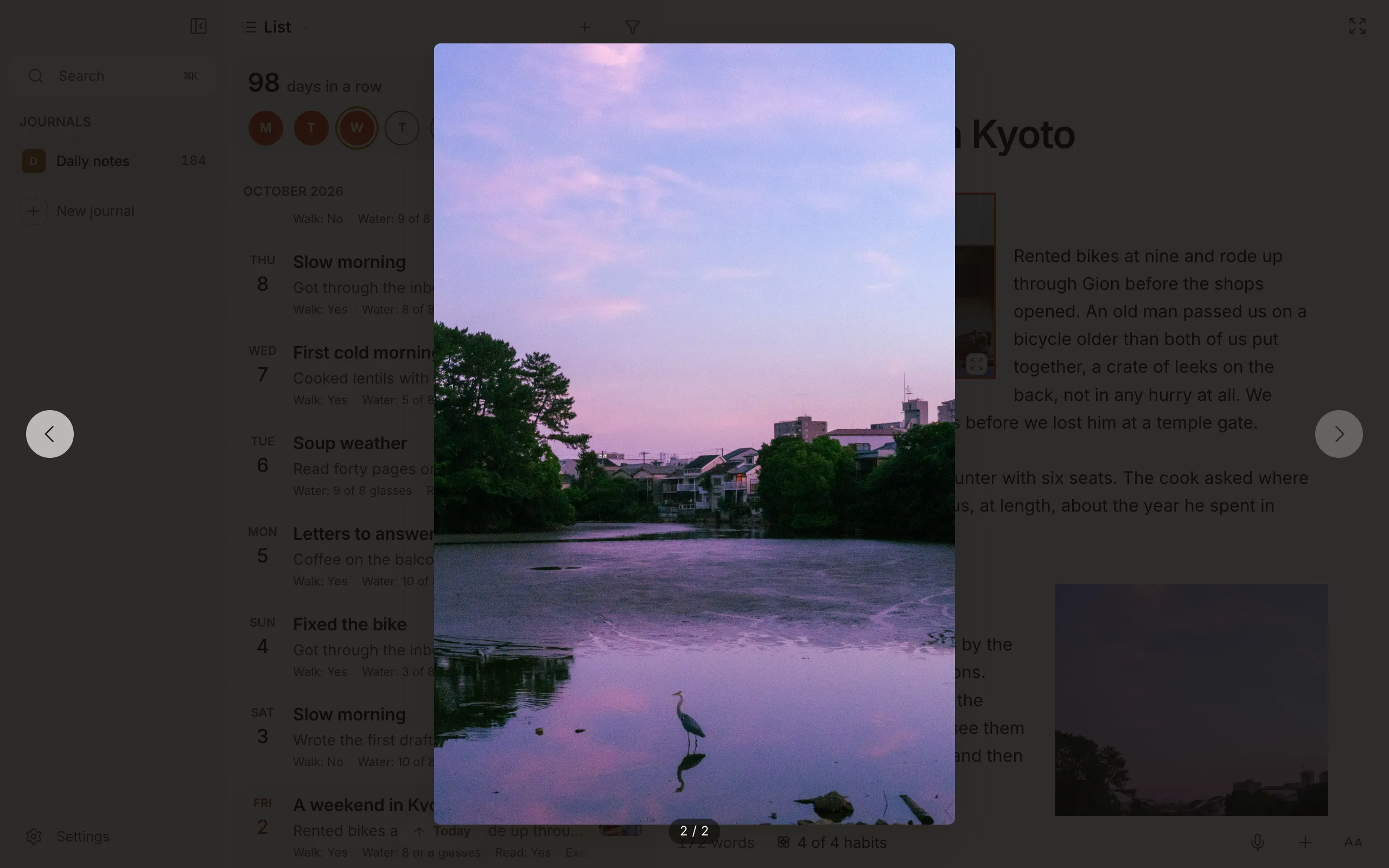 A photo open full-screen in the lightbox, with arrows to step through the entry's photos and a 2 / 2 counter
