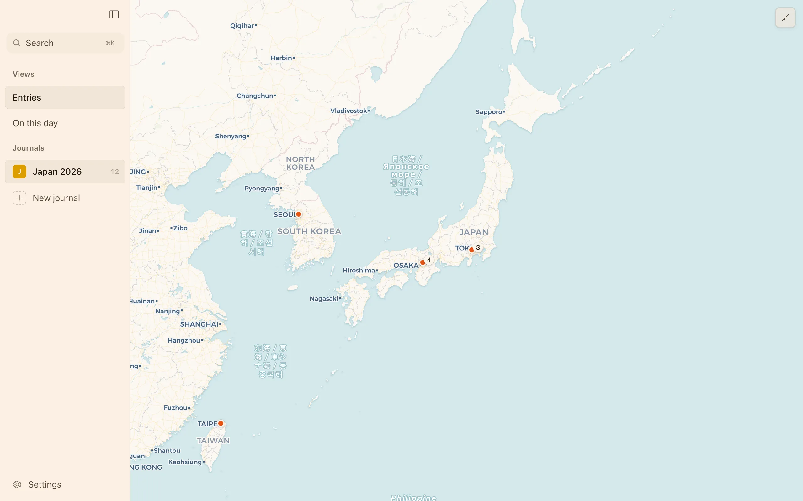 The map filling the whole window, with entry pins spread across the world
